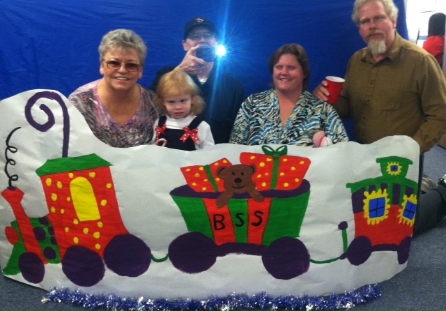 The hill family posing in front of the BSS Choo Choo train